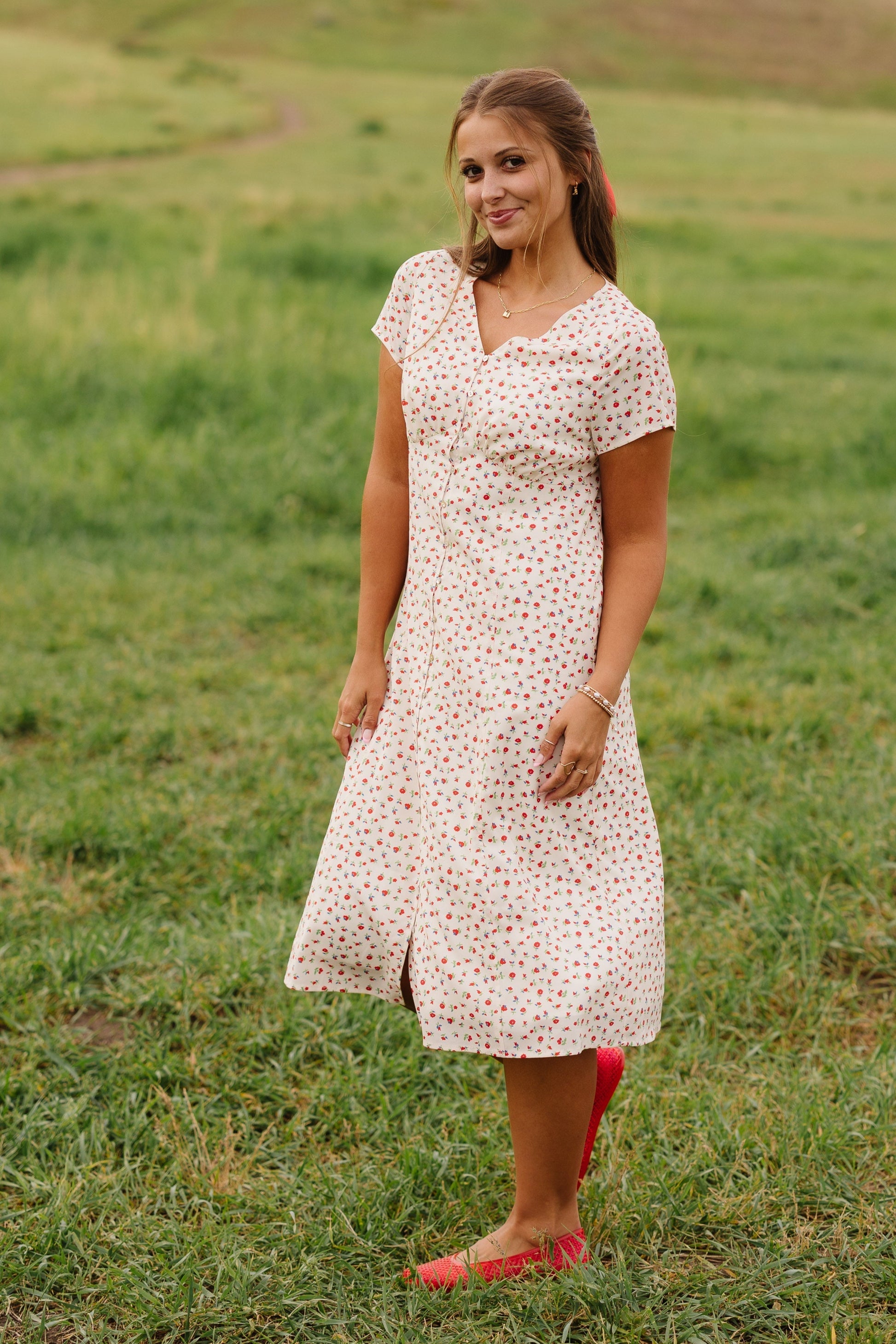 Modest cream button down dress with V-neckline and short sleeves