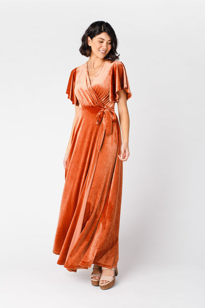 Modest velvet bridesmaid dress in rust with short flutter sleeves