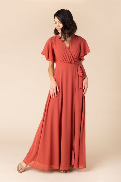 Rust bridesmaid maxi with flutter sleeves