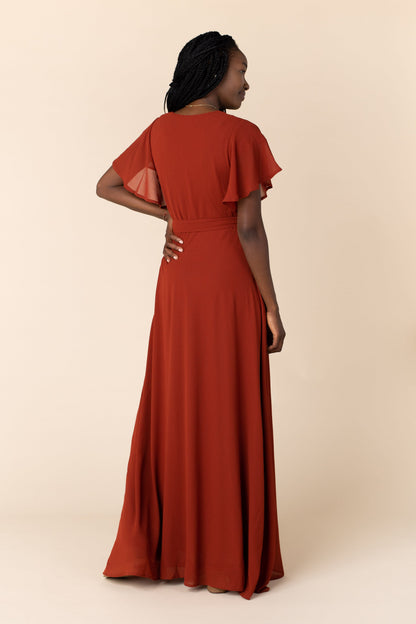 Modest bridesmaid dress in rust with flutter sleeves