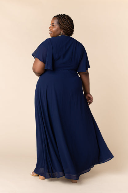 Back view of plus size navy bridesmaid dress